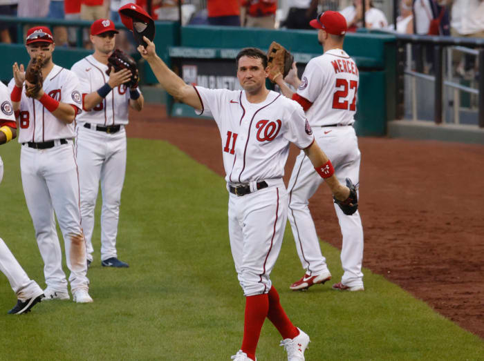 Washington Nationals first baseman Ryan Zimmerman (11) waves to the crowd after being removed from the game against the Boston Red Sox during the eighth inning at Nationals Park.